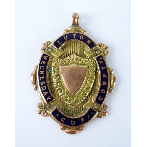 1636 - A 9ct gold and enamel football medal, Luton Wednesday Cup Competition, 5.9gms.