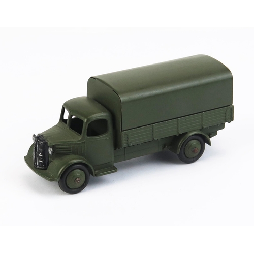 1133A - Dinky 30sm Austin Covered Wagon (US Export Issue) - matt green body, tilt and ridged hubs - very nea... 