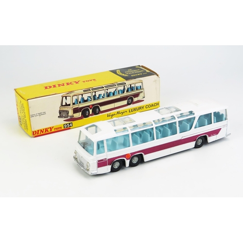 1145 - Dinky 954 Vega Major Luxury Coach - white, metallic purple flash, blue interior, later cast hubs, bl... 