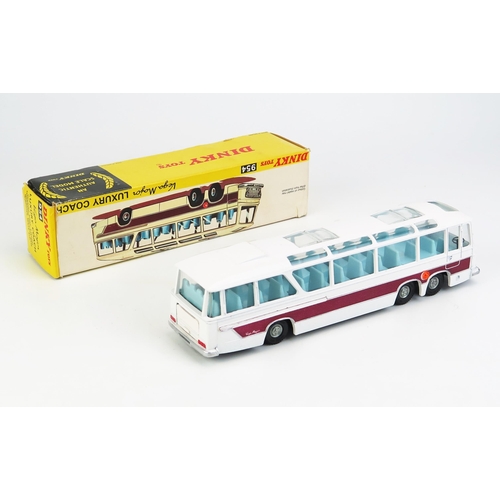 1145 - Dinky 954 Vega Major Luxury Coach - white, metallic purple flash, blue interior, later cast hubs, bl... 