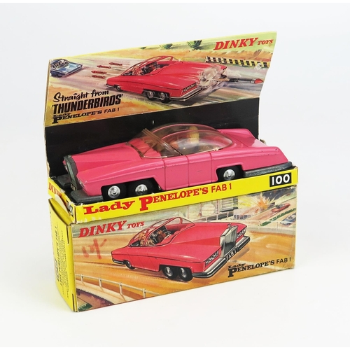 Dinky 100 Lady Penelope's Fab 1 - pink, clear sliding roof with pink stripes (early issue), Lady Penelope and Parker figures, gold-chrome colour interior,  ridged cast hubs, unpainted base - excellent (missing harpoons and missile) in very good+ card picture box with inner pictorial stand