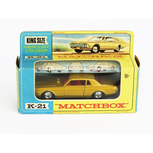 1217 - Matchbox King Size K21 Mercury Cougar - gold, red interior and tow hook, unpainted base, chrome hubs... 