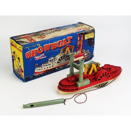 1233 - Kleeware (England) Plastic Mississippi Show Boat, moving parts when wheels are turned with whistle a... 