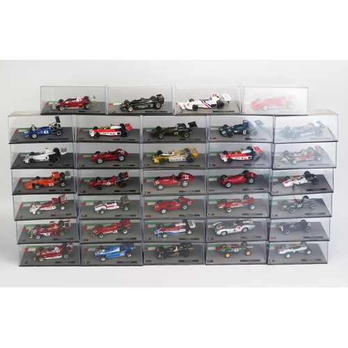 1257 - 34 Panini F1 Model Racing Cars from the 1950's to 1970's, 1:43 Scale including Ferrari, Mercedes, Lo... 