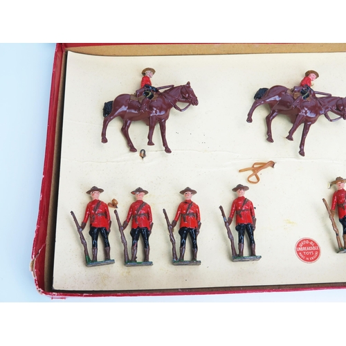 1269 - Johillco Royal Canadian Police - 11 figures (3 mounted) - very good to excellent in poor incorrect W... 