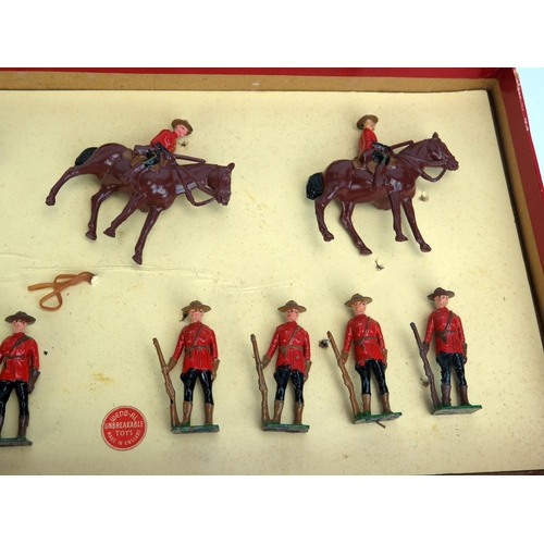 1269 - Johillco Royal Canadian Police - 11 figures (3 mounted) - very good to excellent in poor incorrect W... 