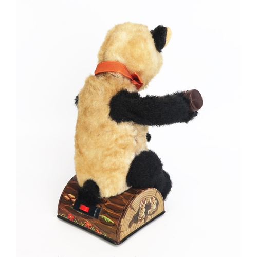 1270 - Alps (Japan) Battery Operated Plush Panda Pouring Cola/Beer sitting on Tinplate Lithographed Log - e... 