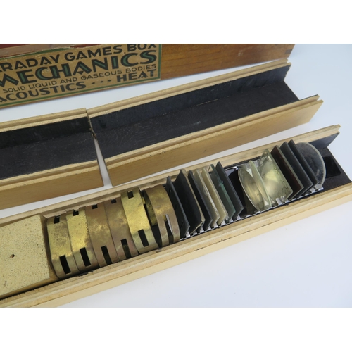 1298A - Optics and Mechanics Faraday Games Boxes containing assorted lenses, filters, gauges, lens holders e... 