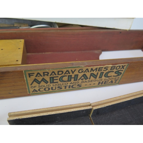 1298A - Optics and Mechanics Faraday Games Boxes containing assorted lenses, filters, gauges, lens holders e... 