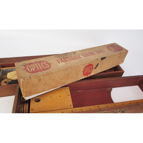 1298A - Optics and Mechanics Faraday Games Boxes containing assorted lenses, filters, gauges, lens holders e... 