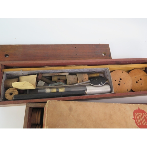 1298A - Optics and Mechanics Faraday Games Boxes containing assorted lenses, filters, gauges, lens holders e... 