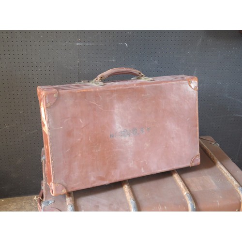 1771A - A Revelation stitched leather suitcase, 66cm wide together with a canvas and wood bound cabin trunk,... 