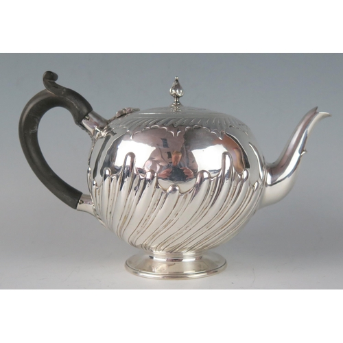 68 - A Victorian silver teapot, maker Charles Stuart Harris, London, 1886, of globular circular for, with... 