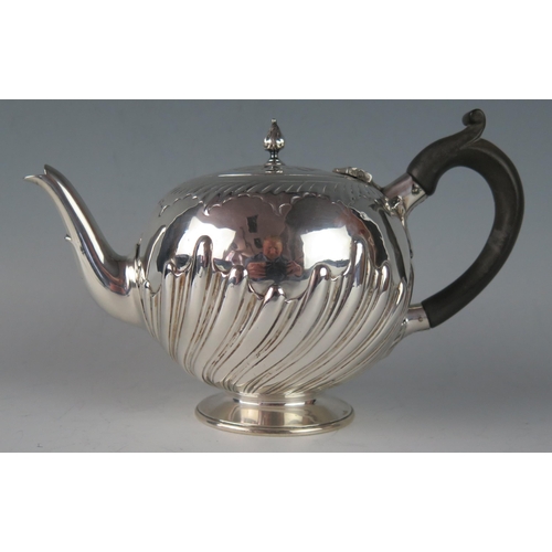 68 - A Victorian silver teapot, maker Charles Stuart Harris, London, 1886, of globular circular for, with... 