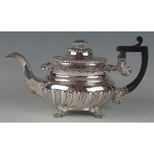 69 - A George IV silver teapot, maker Waterhouse & Ryland, Birmingham, 1824, monogrammed, with moulded fl... 