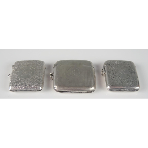 72 - Three silver vesta cases, various makers and dates, all monogrammed, total weight of silver 104gms, ... 