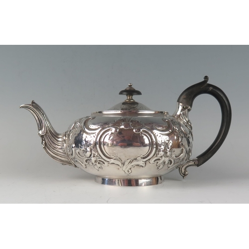 8 - A George III silver teapot, maker Robert Garrard I, London, 1812, crested, of squat circular form, w... 