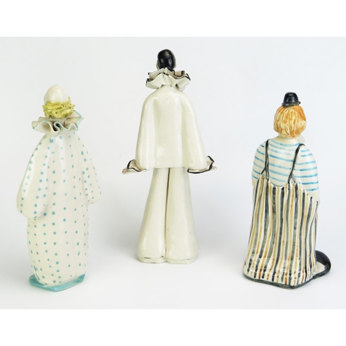 Elizabeth Haslam, three fully glazed models of clowns, in assorted ...