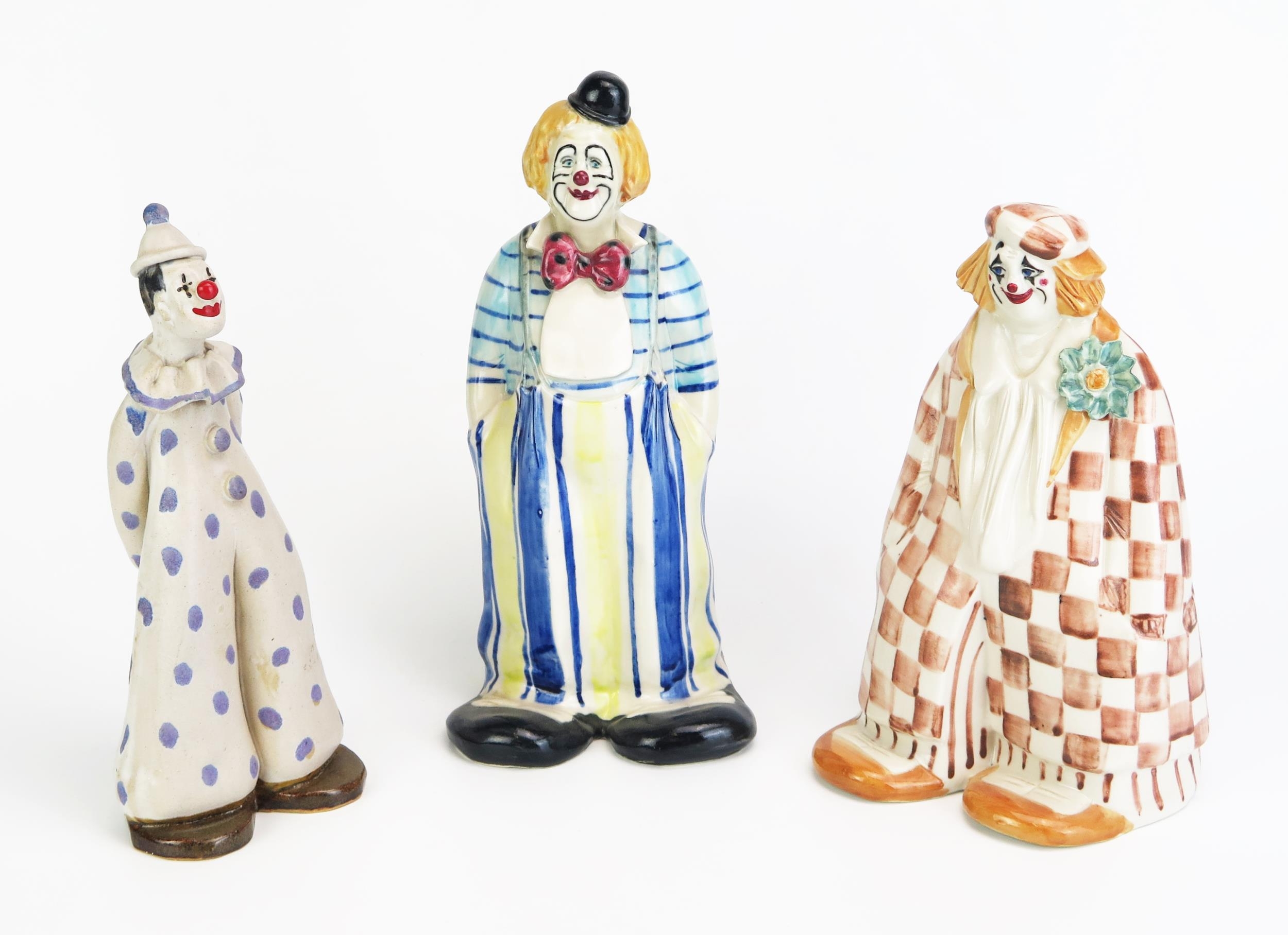 Elizabeth Haslam, three fully glazed models of clowns, in assorted ...
