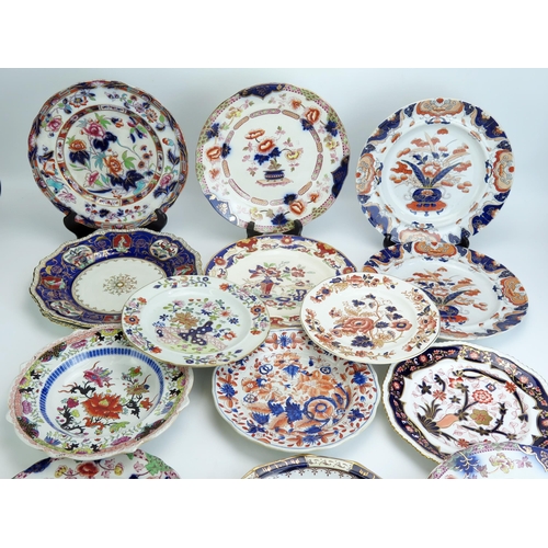 1073 - A collection of Masons and Copeland plates most in the Imari style, including a pair of 1830's perio... 