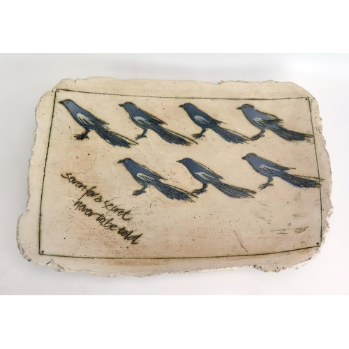 1077 - Laurel Keeley (Contemporary) a stoneware platter with incised magpie decoration, 