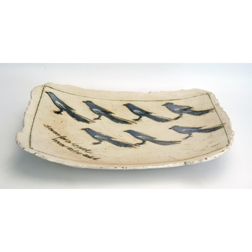 1077 - Laurel Keeley (Contemporary) a stoneware platter with incised magpie decoration, 