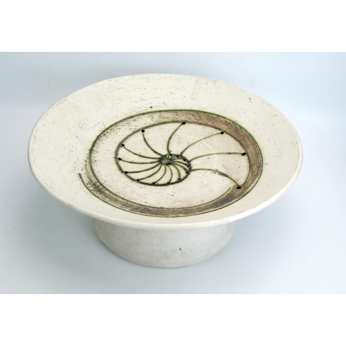 1078 - Laurel Keeley (Contemporary) a stoneware pedestal dish, the centre with incised ammonite and pierced... 