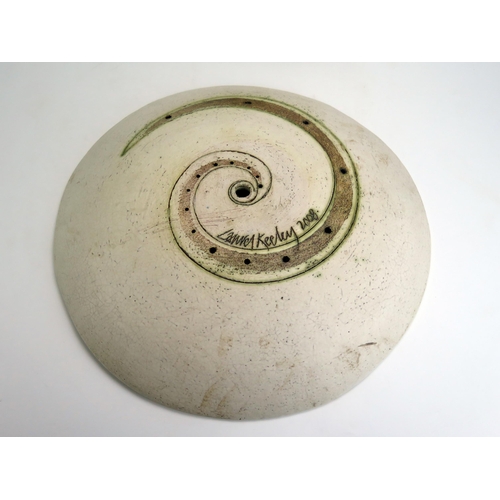 1078 - Laurel Keeley (Contemporary) a stoneware pedestal dish, the centre with incised ammonite and pierced... 