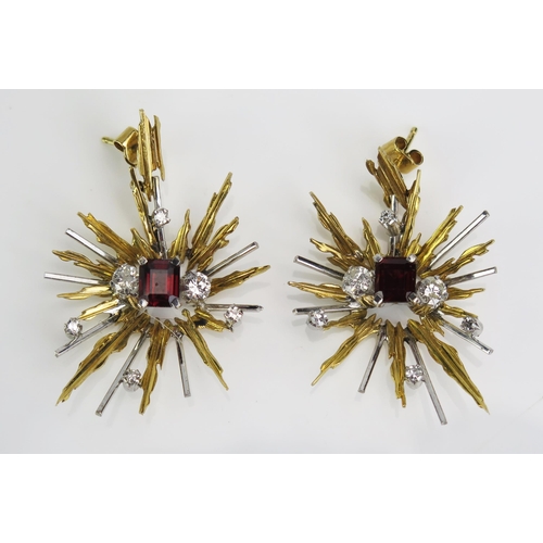 108 - A Pair of 18ct Yellow and White Gold Star Burst Earrings set with diamonds and c. 7x6mm red stone, p... 