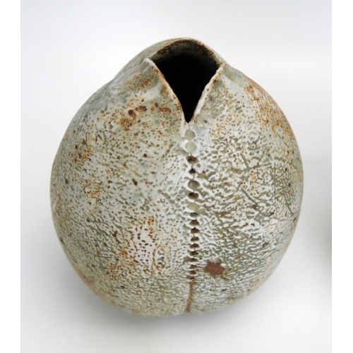 1080 - Alan Wallwork, a stoneware seed pod vase, bears paper studio label, 13cm high, together with another... 