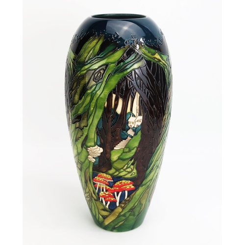 A Moorcroft pottery vase with 'Ancient Woodland decoration by Paul Hilditch, released in 2019 for RSPB Collection, limited edition of 20 and signed by artist to the base, 37cm high.