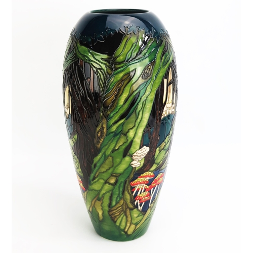 1093 - A Moorcroft pottery vase with 'Ancient Woodland decoration by Paul Hilditch, released in 2019 for RS... 