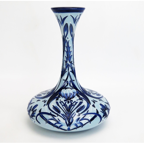 1098 - A Moorcroft pottery vase with 'Rachel' blue on blue ships decanter style vase by Rachel Bishop, rele... 