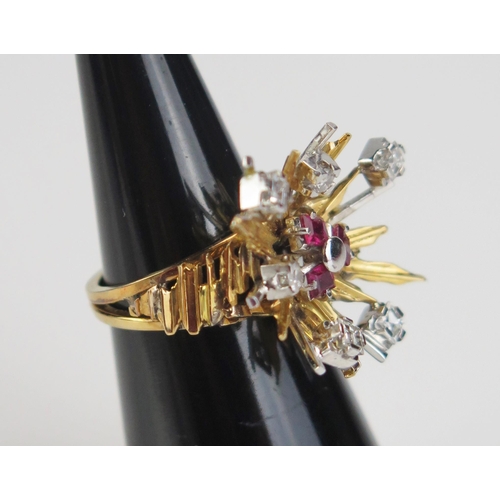 110 - A Diamond and Red Stone Ring in a precious yellow and white metal setting, KEE tested as 18ct, princ... 