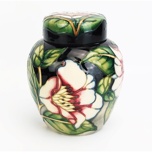 1101 - A Moorcroft pottery ginger jar and cover, with 'Cavendish' pattern decoration designed by Philip Gib... 