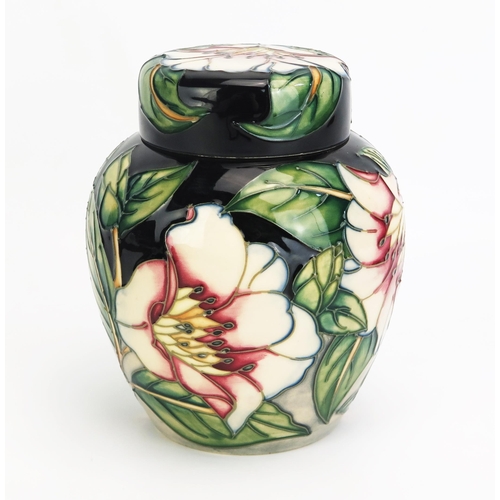 1101 - A Moorcroft pottery ginger jar and cover, with 'Cavendish' pattern decoration designed by Philip Gib... 