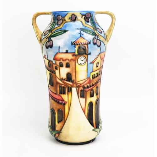 1102 - A Moorcroft pottery twin handled vase with 'Cetona' decoration, designed  by Beverley Wilkes, releas... 