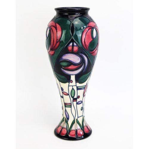 1103 - A Moorcroft pottery vase with Charles Rennie Mackintosh style decoration, designed by Rachel Bishop,... 