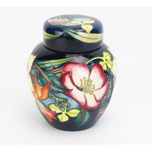 1111 - A Moorcroft pottery ginger jar and cover, with 'Golden Jubilee' decoration, designed by Emma Bossons... 