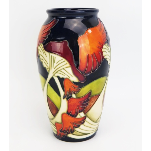 1115A - A Moorcroft pottery vase with 'Parasol Dance' decoration by Kerry Goodwin, released in 2006, 19cm hi... 