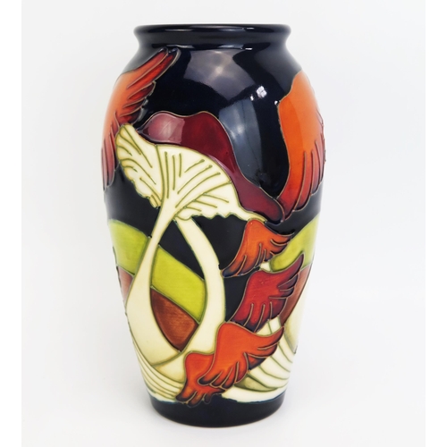 1115A - A Moorcroft pottery vase with 'Parasol Dance' decoration by Kerry Goodwin, released in 2006, 19cm hi... 