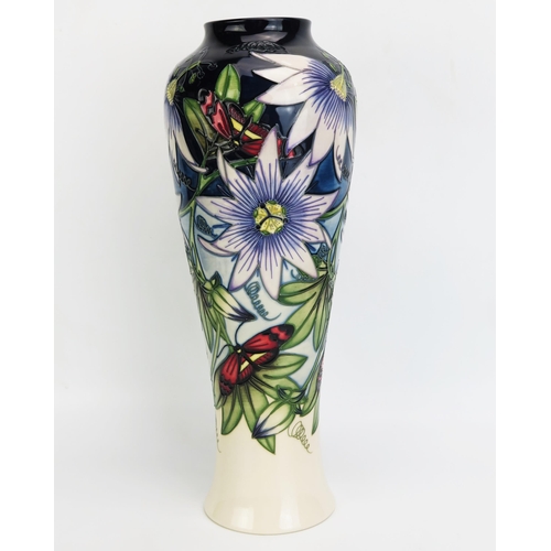 1118 - A Moorcroft pottery vase with 'Star of Mikan' decoration designed by Sian Leeper, released in 2004, ... 