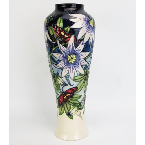 1118 - A Moorcroft pottery vase with 'Star of Mikan' decoration designed by Sian Leeper, released in 2004, ... 