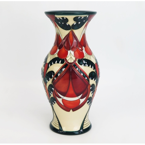 1119 - A Moorcroft pottery vase with 'Temple of the Sun' decoration designed by Paul Hilditch, released in ... 