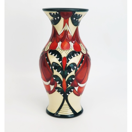 1119 - A Moorcroft pottery vase with 'Temple of the Sun' decoration designed by Paul Hilditch, released in ... 