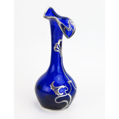 1148 - An Art Nouveau period continental blue glass and silver mounted vase of ovoid form with slender neck... 