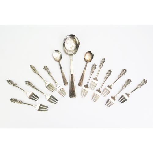 1159 - A set of eleven Chinese silver pastry forks, with figural terminals together with a Vietnamese silve... 