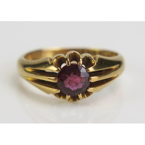 116 - An 18ct Gold and Red Stone Solitaire Ring, c. 6mm stone, size P.5, Birmingham 1915, c.5.85g