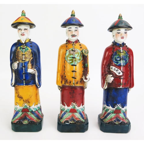 1160 - A set of three Chinese porcelain figures depicting three stages of man, includes youth, middle-aged ... 