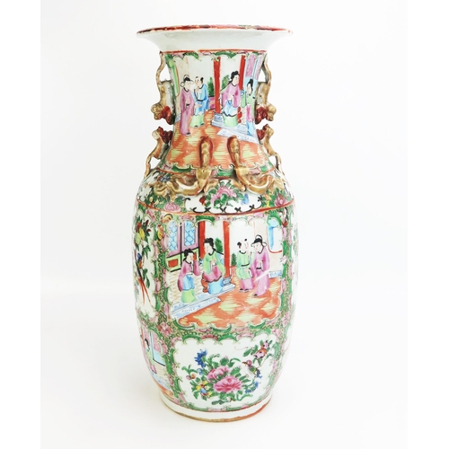 1161 - A large late 19th century Cantonese porcelain export ware vase painted coloured enamels of panels de... 